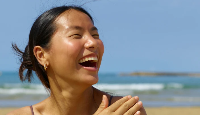 Happy woman on beach